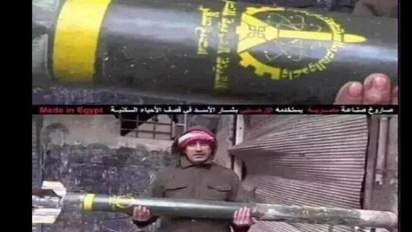 مواطن سوري يحمل صاروخ مصري سقط على حي صاخور بحلب و لم ينفجر
